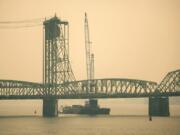 The lift towers on the northbound span of the Interstate 5 Bridge in Vancouver are shrouded by smoky air from wildfires on Sept. 1.