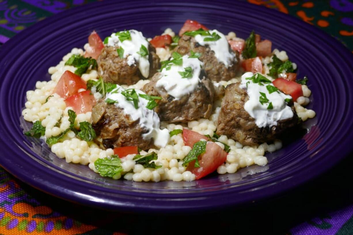 Middle Eastern Meatballs With Herbed Couscous (Linda Gassenheimer/TNS)