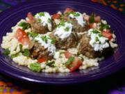 Middle Eastern Meatballs With Herbed Couscous (Linda Gassenheimer/TNS)