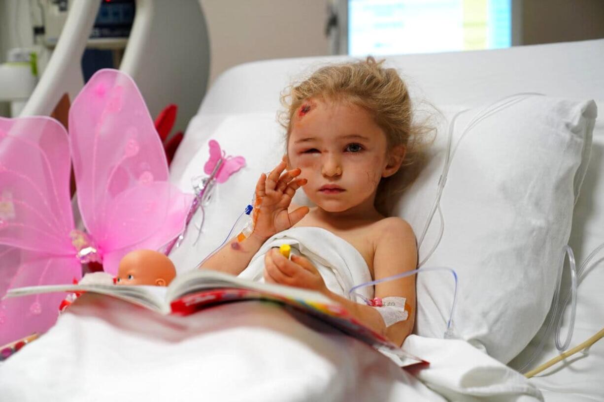 In this photo made available by Turkey's Health Ministry, 3-year-old girl Elif Perincek rests in her hospital bed after she was rescued from the rubble of a building some 65 hours after a magnitude 6.6 earthquake in Izmir, Turkey, Monday, Nov. 2, 2020. Rescue teams continue ploughing through concrete blocs and debris of collapsed buildings in Turkey's third largest city in search of survivors of a powerful earthquake that struck Turkey's Aegean coast and north of the Greek island of Samos, Friday Oct. 30, killing dozens. Close to a thousand people were injured.