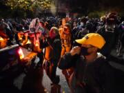 People march on the night of the election, Tuesday, Nov. 3, 2020, in Portland, Ore.