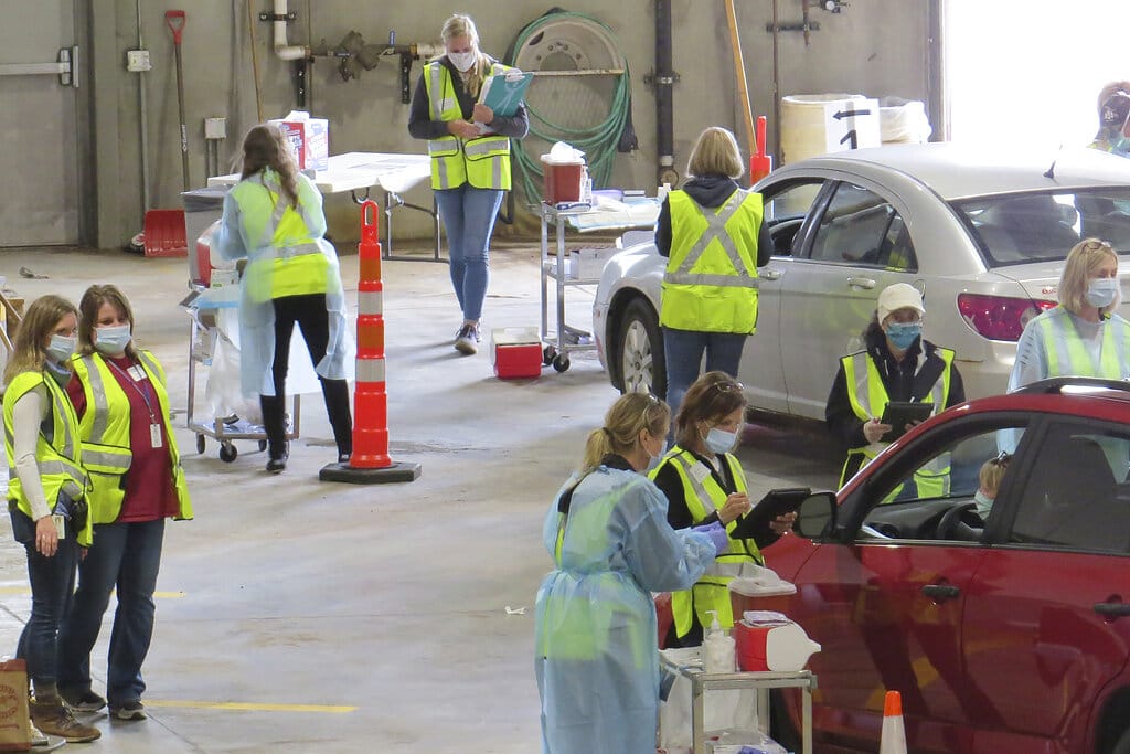 This 2020 photo provided by Carlton County shows their drive-thru flu clinic in Carlton, Minn. The facility is a way to social distance in the coronavirus pandemic, but also served as a test run for the COVID-19 vaccines that county health officials still know little about.