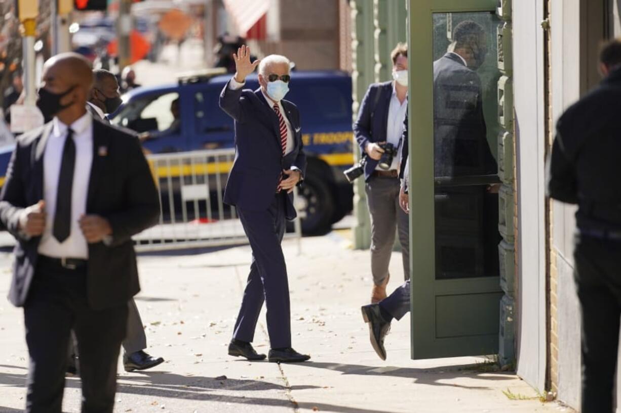 President-elect Joe Biden arrives to attend a briefing on the economy at The Queen theater, Monday, Nov. 16, 2020, in Wilmington, Del.