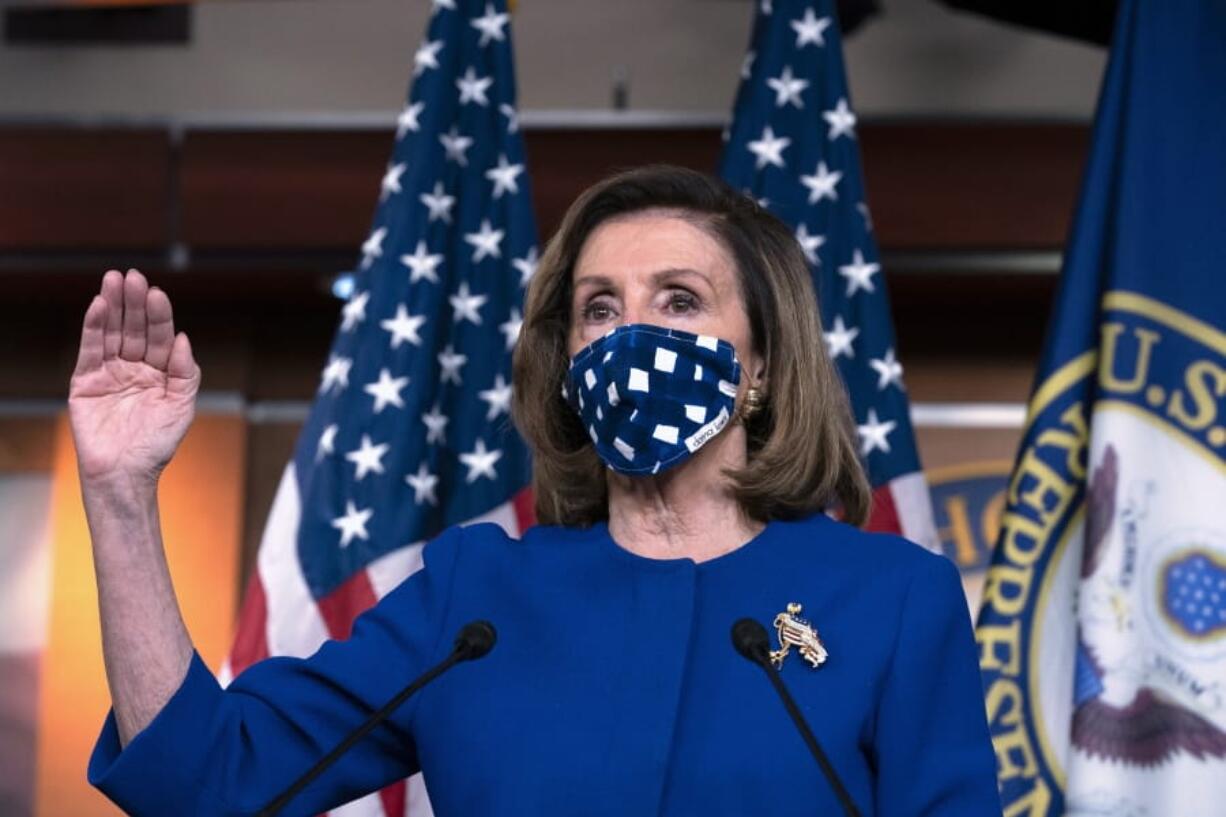 In this Oct. 22, 2020, photo, House Speaker Nancy Pelosi, D-Calif. speaks during a news conference on Capitol Hill, in Washington. In Election 2020, control of the House is not in dispute and Speaker Nancy Pelosi is expanding her reach by working to fortify Joe Biden and win extra seats in case Congress is called on to resolve any Electoral College dispute.