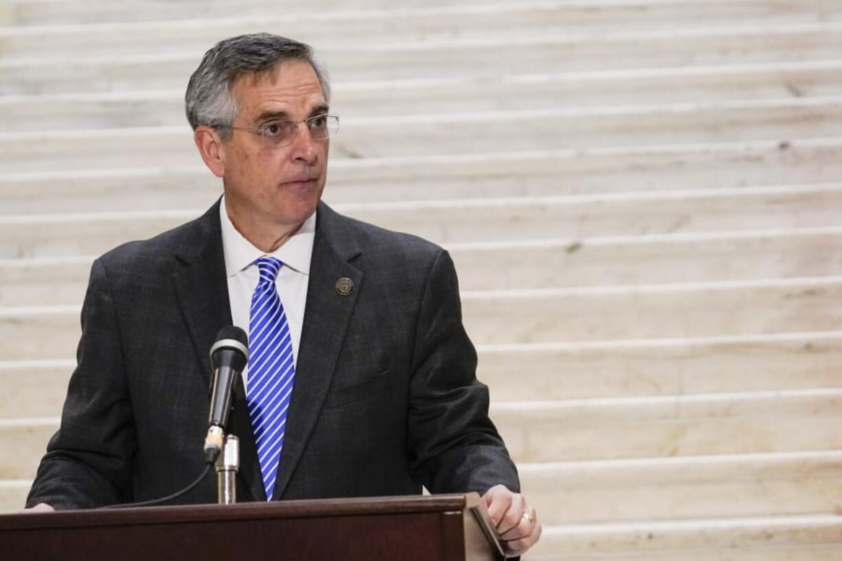 Georgia Secretary of State Brad Raffensperger speaks during a news conference on Friday, Nov. 20, 2020, in Atlanta.  Georgia&#039;s top elections official said he will certify that Joe Biden won the state&#039;s presidential election after a hand tally stemming from a mandatory audit affirmed the Democrat&#039;s lead over Republican President Donald Trump.