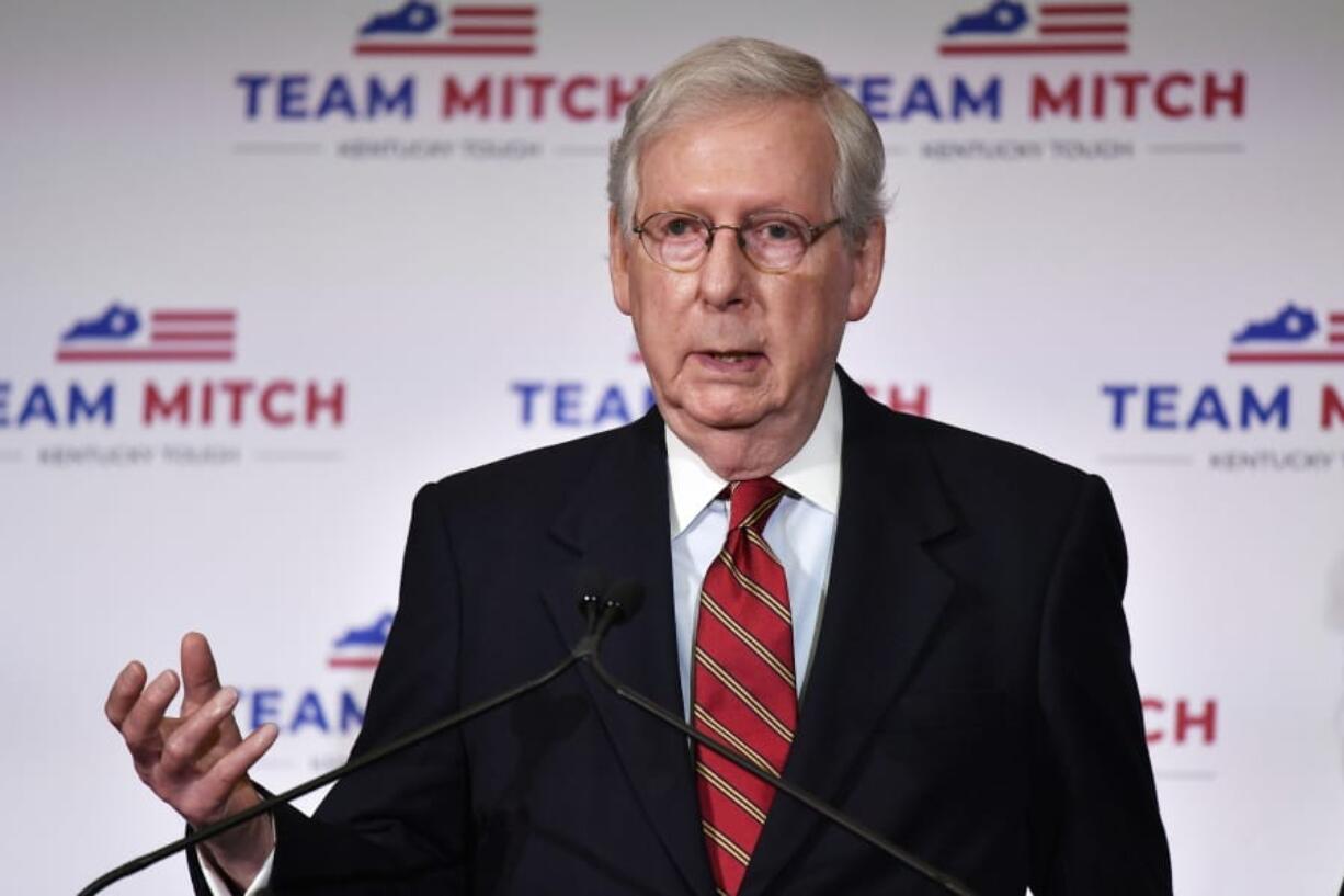 Senate Majority Leader Mitch McConnell, R-Ky., speaks with reporters during a press conference in Louisville, Ky., Wednesday, Nov. 4, 2020. McConnell secured a seventh term in Kentucky, fending off Democrat Amy McGrath, a former fighter pilot in a costly campaign. (AP Photo/Timothy D.