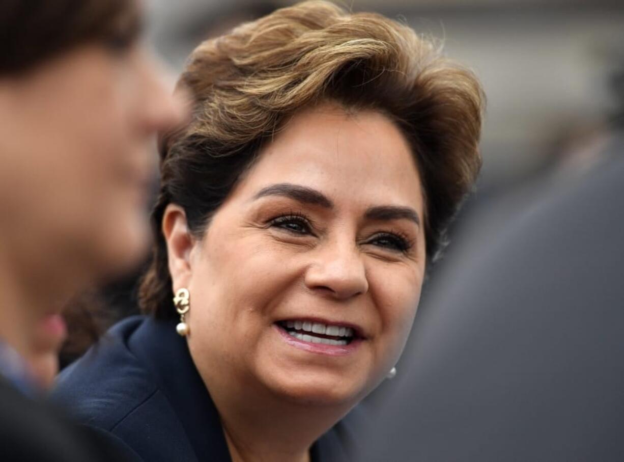 FILE - In this Saturday, Nov. 11, 2017 file photo, Patricia Espinosa, executive secretary of the United Nations Framework Convention on Climate Change, smiles in the U.S. Climate Action Center during the &quot;AMERICA&#039;S PLEDGE&quot; and &quot;WE ARE STILL IN&quot; campaign at the COP 23 Fiji UN Climate Change Conference in Bonn, Germany. The U.N.&#039;s climate chief Patricia Espinosa says deadlines set by some of the world&#039;s top polluters to end greenhouse gas emissions, along with president-elect Joe Biden&#039;s pledge to take the United States back into the Paris accord, have boosted hopes of meeting the pact&#039;s ambitious goals.