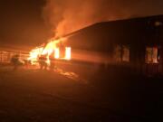 A large horse arena was destroyed by a fire early Wednesday morning southwest of Battle Ground.