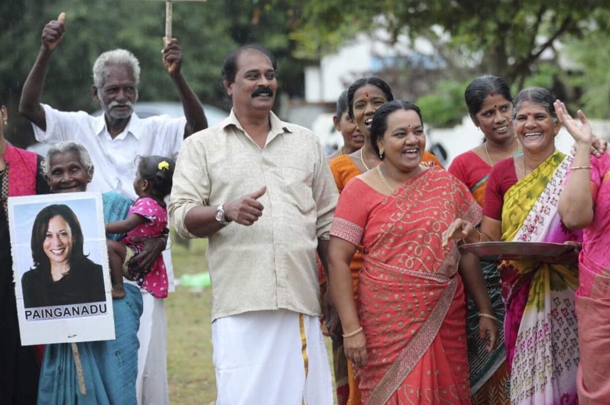 Villagers celebrate the victory of U.S. Vice President-elect Kamala Harris in Painganadu a neighboring village of Thulasendrapuram, the hometown of Harris&#039; maternal grandfather, south of Chennai, Tamil Nadu state, India, Sunday, Nov. 8, 2020. Waking up to the news of Kamala Harris&#039; election as Joe Biden&#039;s running mate, overjoyed people in her Indian grandfather&#039;s hometown are setting off firecrackers, carrying her placards and offering prayers.