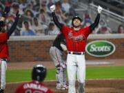 Atlanta Braves&#039; Freddie Freeman celebrates as he crosses home plate after hitting a grand slam against the Washington Nationals ion Sept. 4, 2020. Freeman easily won the NL MVP award Thursday, Nov.