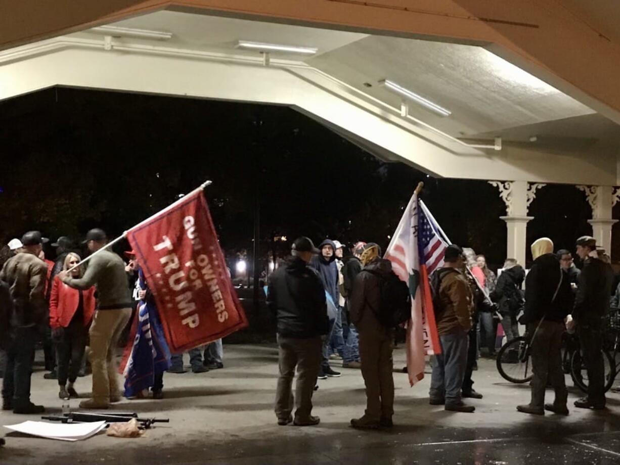 About 200 people gathered Saturday afternoon for a "Stop the Steal" rally in support of President Donald Trump in downtown Vancouver's Esther Short Park.