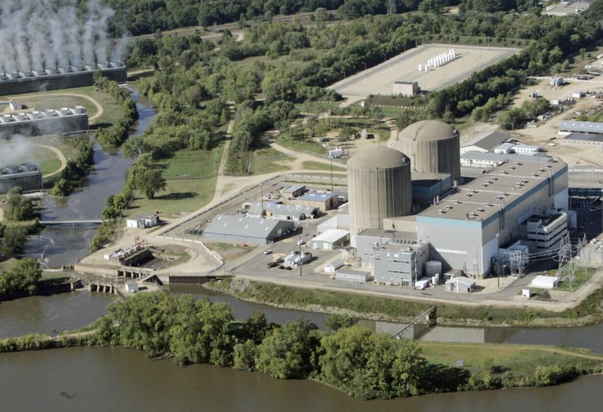 FILE - This Sept. 23, 2005 file photo shows the Prairie Island nuclear power plant near Red Wing, Minn. The U.S. Department of Energy announced in November 2020 it has awarded just under $14 million for an attempt to build a hydrogen-energy producing facility with the help of a nuclear research lab in Idaho. The Idaho National Laboratory and Minneapolis-based Xcel Energy will work on devising and building the facility, most likely at Xcel Energy&#039;s Prairie Island Nuclear Generating Station.