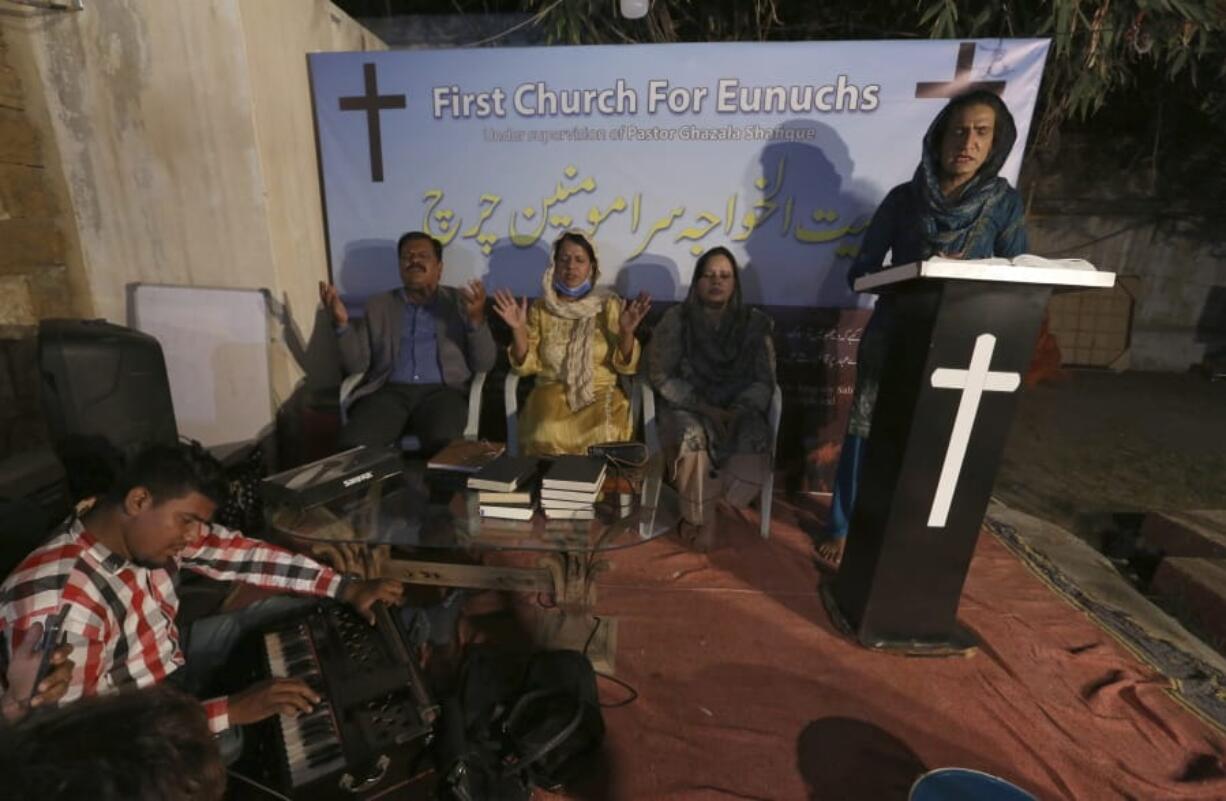 Nisara Gill, right, leads a prayer service at Pakistan&#039;s first church for transgender worshippers, in Karachi, Pakistan, Friday, Nov. 13, 2020. Transgender Pakistanis are often mocked, abused and bullied, and Christians among them are a minority within a minority, often shunned even in churches.