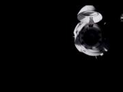 In this frame grab from NASA TV, the SpaceX Dragon capsule approaches the International Space Station, late Monday, Nov. 16, 2020.