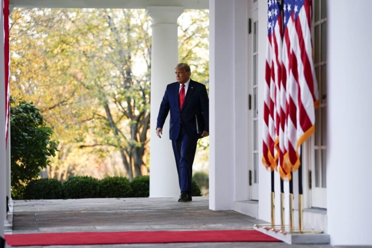 President Donald Trump arrives to speak in the Rose Garden of the White House, Friday, Nov. 13, 2020, in Washington.