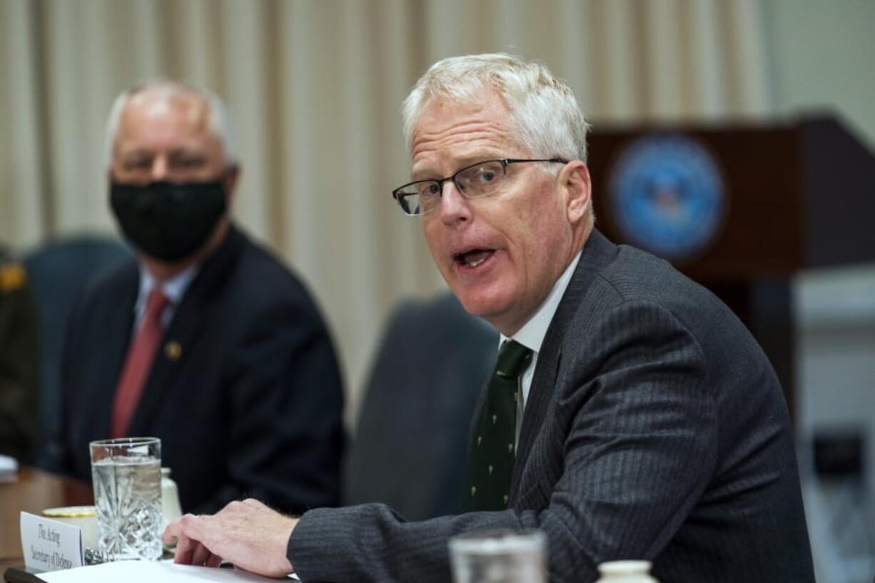 Acting Secretary of Defense Christopher Miller speaks during a meeting with Lithuanian Minister of National Defence Raimundas Karoblis at the Pentagon, Friday, Nov. 13, 2020.