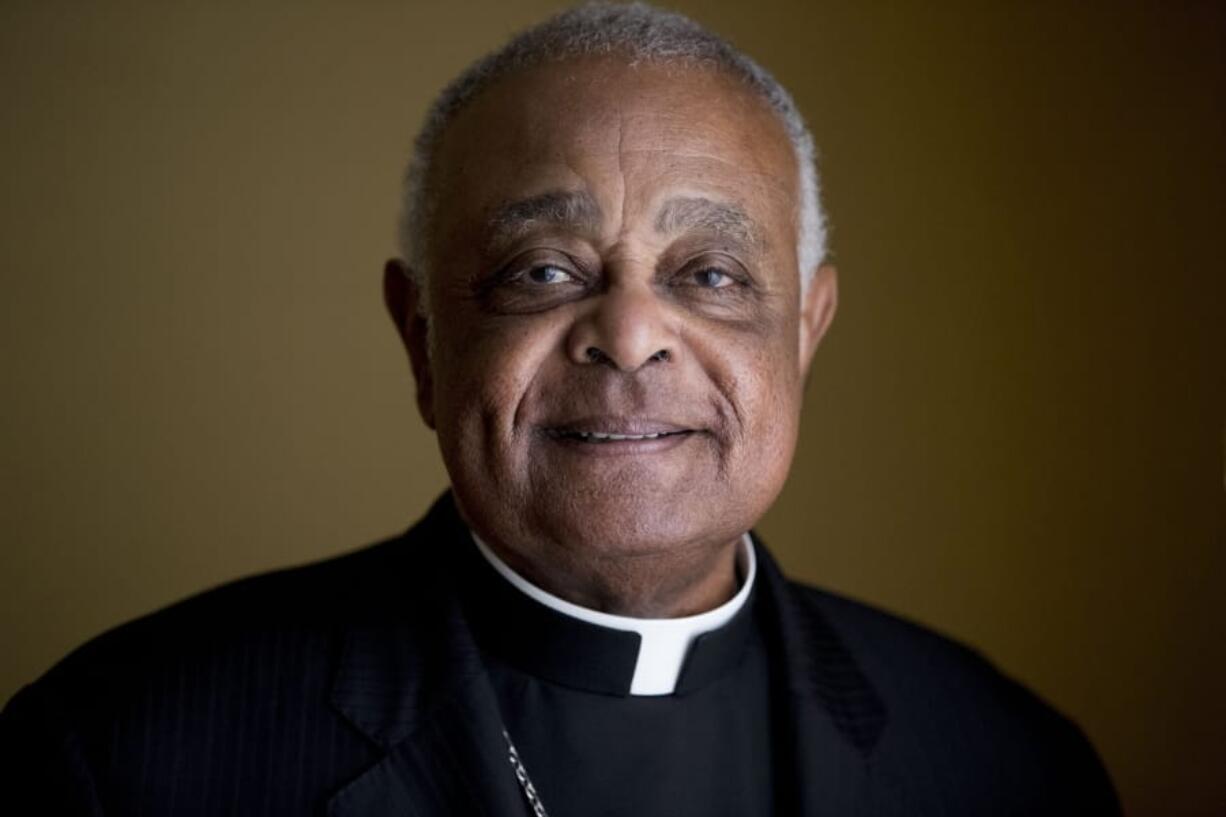 FILE - This Sunday, June 2, 2019, file photo shows Washington D.C. Archbishop Wilton Gregory posed for a portrait following mass at St. Augustine Church in Washington. Gregory, who is undergoing quarantine at the Santa Marta hotel before Saturday&#039;s consistory, said that while he was unable to go out, at least he was able to get his new red cassock delivered from Rome&#039;Aos famous clerical haberdasher, Gammarelli.