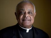 FILE - This Sunday, June 2, 2019, file photo shows Washington D.C. Archbishop Wilton Gregory posed for a portrait following mass at St. Augustine Church in Washington. Gregory, who is undergoing quarantine at the Santa Marta hotel before Saturday&#039;s consistory, said that while he was unable to go out, at least he was able to get his new red cassock delivered from Rome&#039;Aos famous clerical haberdasher, Gammarelli.