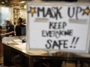 Waitress Kim Iannacone, left, and manager Yllka Murati gather food orders at the Penrose Diner, Tuesday, Nov. 17, 2020, in south Philadelphia. Philadelphia plans to prohibit indoor dining at restaurants, shutter casinos, gyms, museums and libraries, pause in-person instruction at colleges and high schools, and reduce occupancy at stores and religious institutions, the health commissioner, Dr. Thomas Farley, said at a news conference Monday as the city battles a resurgence of the coronavirus. (AP Photo/Matt Slocum) (gene j.