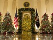 Cross Hall and the Blue Room are decorated during the 2020 Christmas preview at the White House, Monday, Nov. 30, 2020, in Washington.