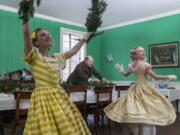 Olivia Hill, 11, left; her father, Jeffrey; and her sister Charlotte, 8, shoot a preview video for Columbia Dance&#039;s historical version of &quot;The Nutcracker&quot; at Fort Vancouver.