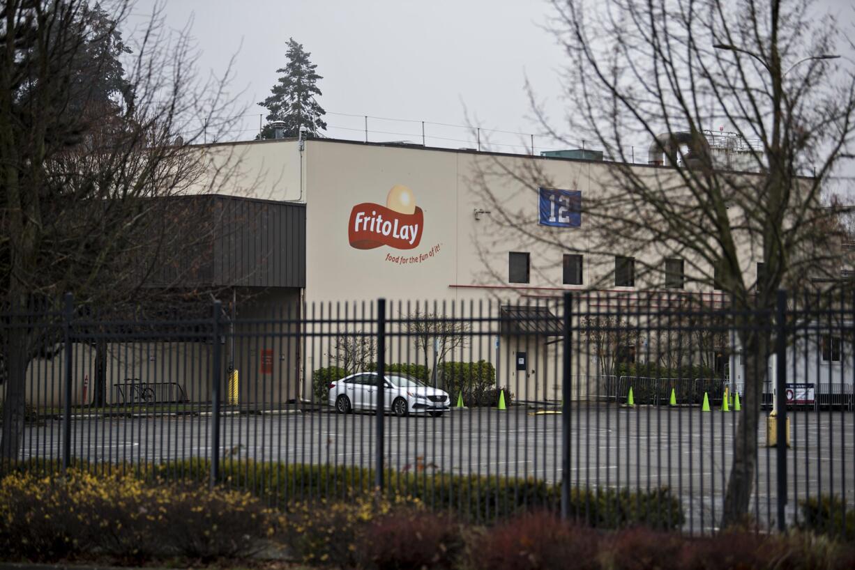 A nearly empty parking lot is seen at the Frito Lay factory in Fruit Valley on Tuesday morning, December 1, 2020.