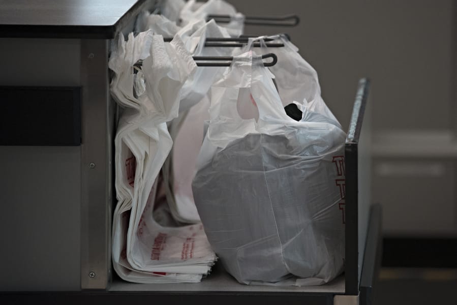 Goodwill and other retailers who use plastic bags will need to switch to paper bags or multi-use bags with thicker plastic under a new law that was previously scheduled to take effect Jan. 1.