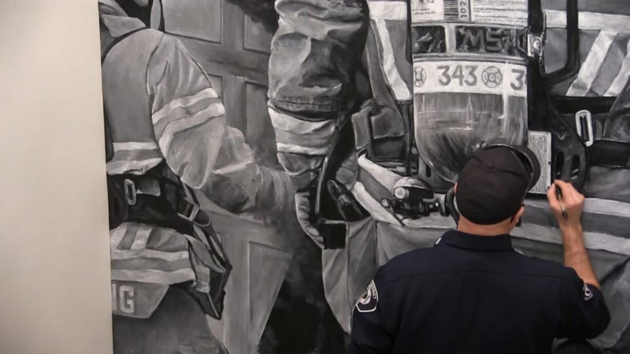 SALMON CREEK: Capt. Clint Greeley at Clark County Fire District 6 created a mural at the new station representing the difficult nature of the job as well as to honor victims in the Sept.