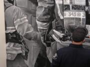 SALMON CREEK: Capt. Clint Greeley at Clark County Fire District 6 created a mural at the new station representing the difficult nature of the job as well as to honor victims in the Sept.