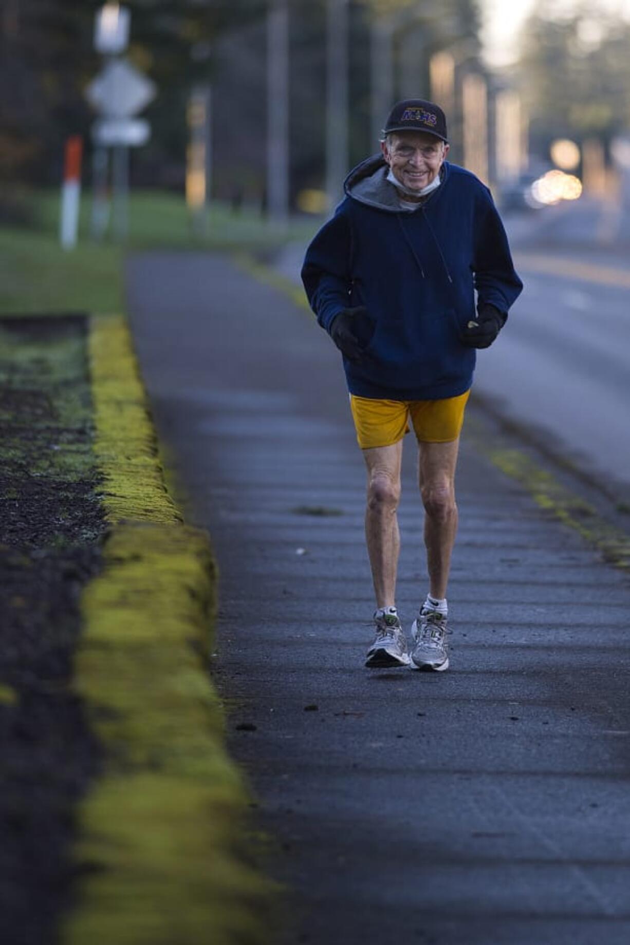 Jerry Kotsovos of Camas, pictured on his daily run Wednesday afternoon, December 23, 2020, has been running for 46 years. Now at the age of 74, he will reach a milestone of running his 130,000th mile on Christmas Day.