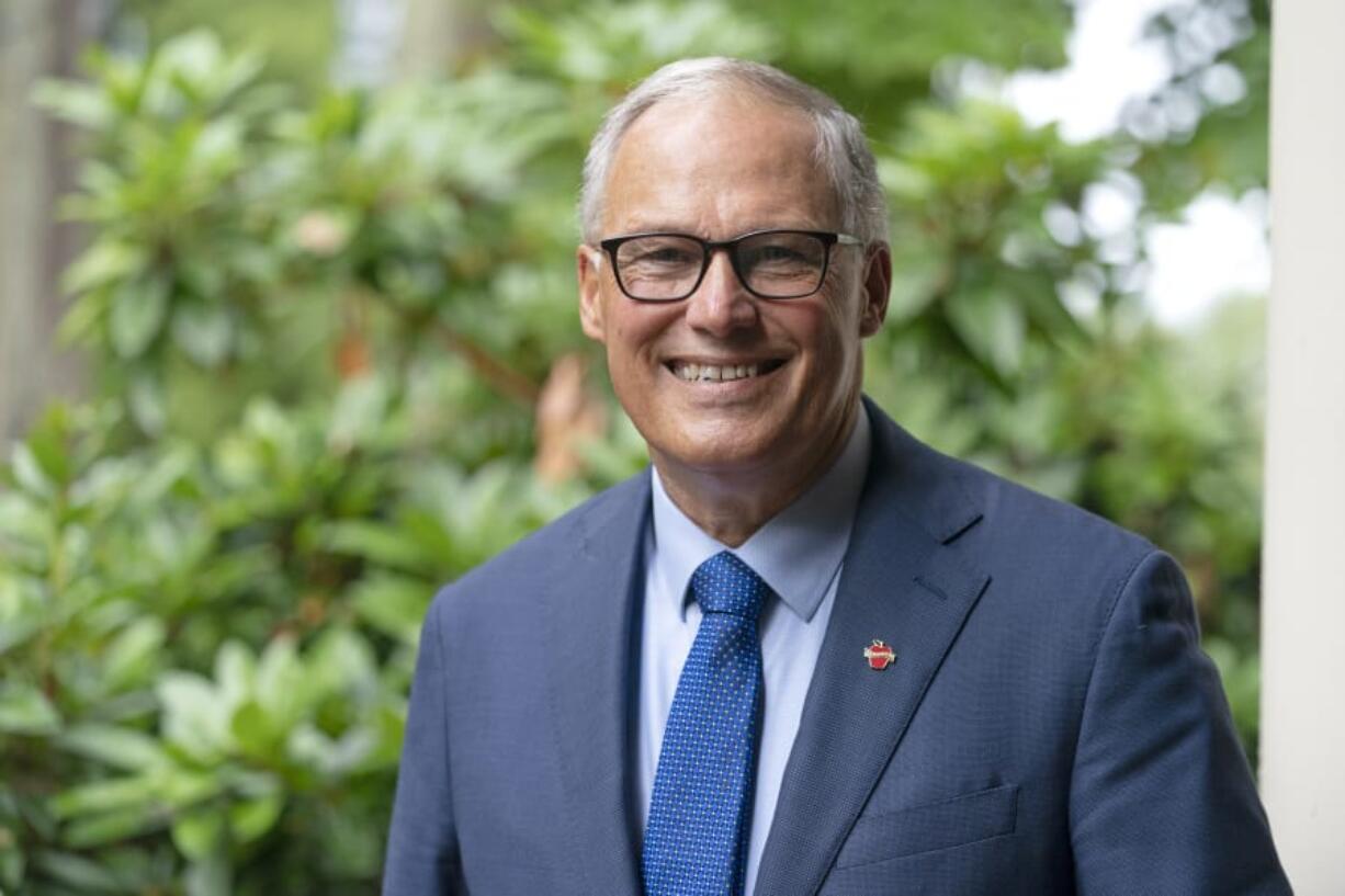 Washington Gov. Jay Inslee poses for a photo, Friday, Sept. 25, 2020, in Olympia, Wash.  (AP Photo/Ted S.