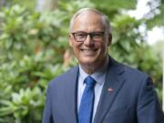 Washington Gov. Jay Inslee poses for a photo, Friday, Sept. 25, 2020, in Olympia, Wash.  (AP Photo/Ted S.