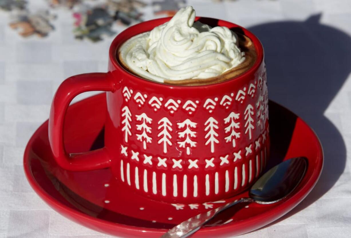 Hot chocolate, like this Parisian Hot Chocolate, is topped with Chantilly cream. (Photos by Hillary Levin/St.