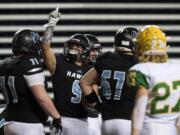 Hockinson&#039;s Sawyer Racanelli (9) celebrates a touchdown during the 2A state football championship game against Lynden on Saturday, Dec. 1, 2018, in Tacoma, Wash.