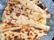 Charles Schrag of Seattle has been making the traditional Norwegian food lefse since he was young. Schrag shows off his lefse, which is similar to a flatbread, made with potatoes near his Seattle-area home Dec. 7, 2020.