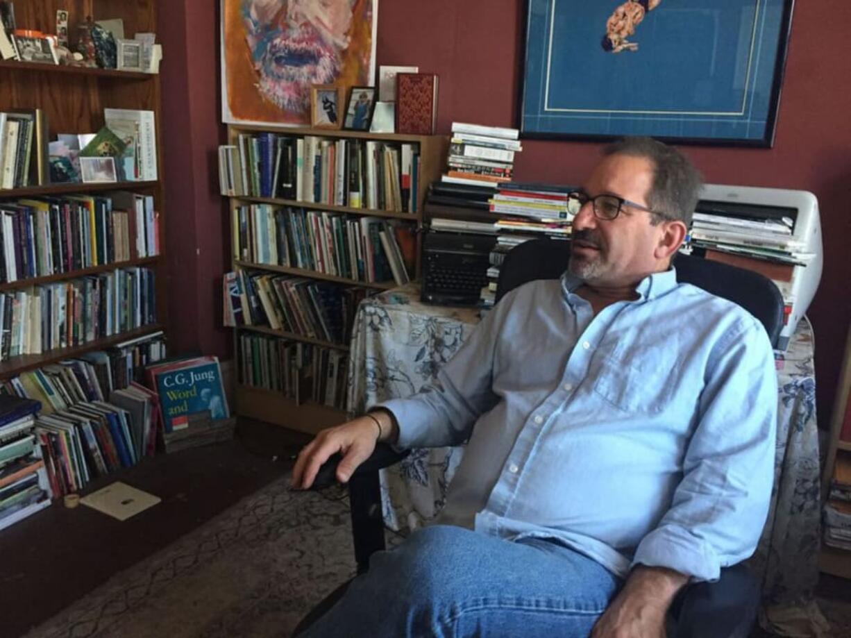 David Biespiel in 2019, in his office at the former home of the Attic Institute, a writing center he founded.