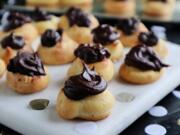 These airy, tender puffs are filled with a ganache made from dark chocolate and Nutella. Because they&#039;re bite-sized, they&#039;re perfect for a party.