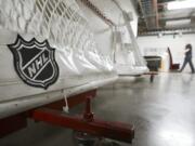 The National Hockey League and players reached a tentative deal Friday, Dec. 18, 2020, to hold a 56-game season in 2021, pending the approval of each side&#039;s executive board and Canadian health officials.