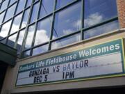 A sign outside of Bankers Life Fieldhouse shows the display for the Gonzaga vs. Baylor basketball game that was scheduled to play in an NCAA college basketball game, Saturday, Dec. 5, 2020, in Indianapolis. The game was canceled due to COVID.