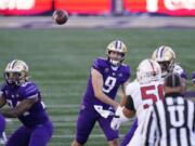 Washington quarterback Dylan Morris (9) throws against Stanford in the first half of an NCAA college football game Saturday, Dec. 5, 2020, in Seattle.