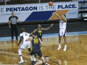 Gonzaga guard Jalen Suggs (1) shoot a 3-pointer during the first half of an NCAA college basketball game against Iowa, Saturday, Dec. 19, 2020 in SIoux Falls, S.D.