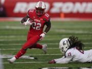 Utah running back Ty Jordan (22), a star freshman running back for the University of Utah who grew up in the Dallas area, has died, school officials announced Saturday, Dec. 26, 2020. Authorities in Texas and Utah have not released details about the circumstances of the Jordan's death. He finished the 2020 season by rushing for 154 yards and three touchdowns against Washington State on Dec. 19, 2020.