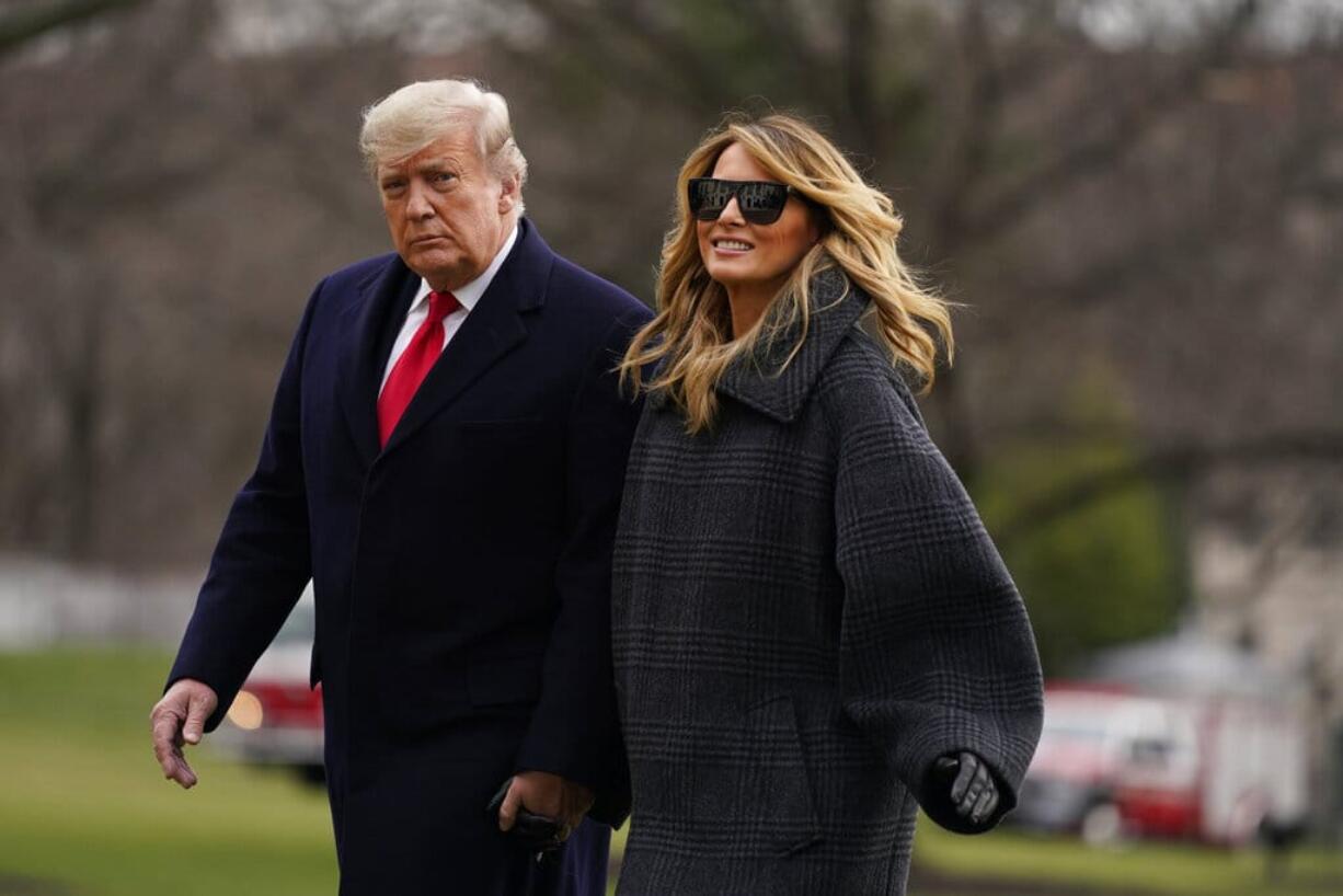 President Donald Trump and first lady Melania Trump arrive on the South Lawn of the White House, Thursday, Dec. 31, 2020, in Washington. Trump is returning to Washington after visiting his Mar-a-Lago resort.