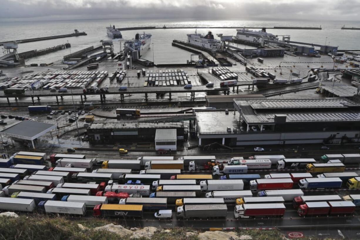 Lorries queue at Check-in at the port in Dover, Friday, Dec. 11, 2020. The U.K. left the EU on Jan. 31, but remains within the bloc&#039;s tariff-free single market and customs union until the end of the year.