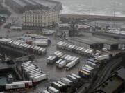 Lorries are parked near the port, Monday, Dec. 21, 2020, after the Port of Dover, England, was closed and access to the Eurotunnel terminal suspended following the French government&#039;s announcement. France banned all travel from the UK for 48 hours from midnight Sunday, including trucks carrying freight through the tunnel under the English Channel or from the port of Dover on England&#039;s south coast.