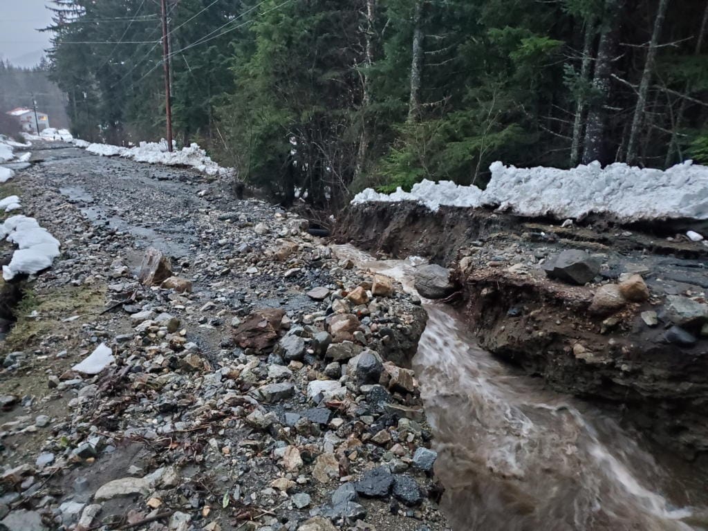 This photo provided by the Alaska Department of Transportation and Public Facilities shows damage from heavy rains and a mudslide 600 feet wide in Haines, Alaska, on Wednesday, Dec. 2, 2020. Authorities say six people are unaccounted for, and four homes were destroyed in the slide, with the search resuming Thursday morning for survivors.