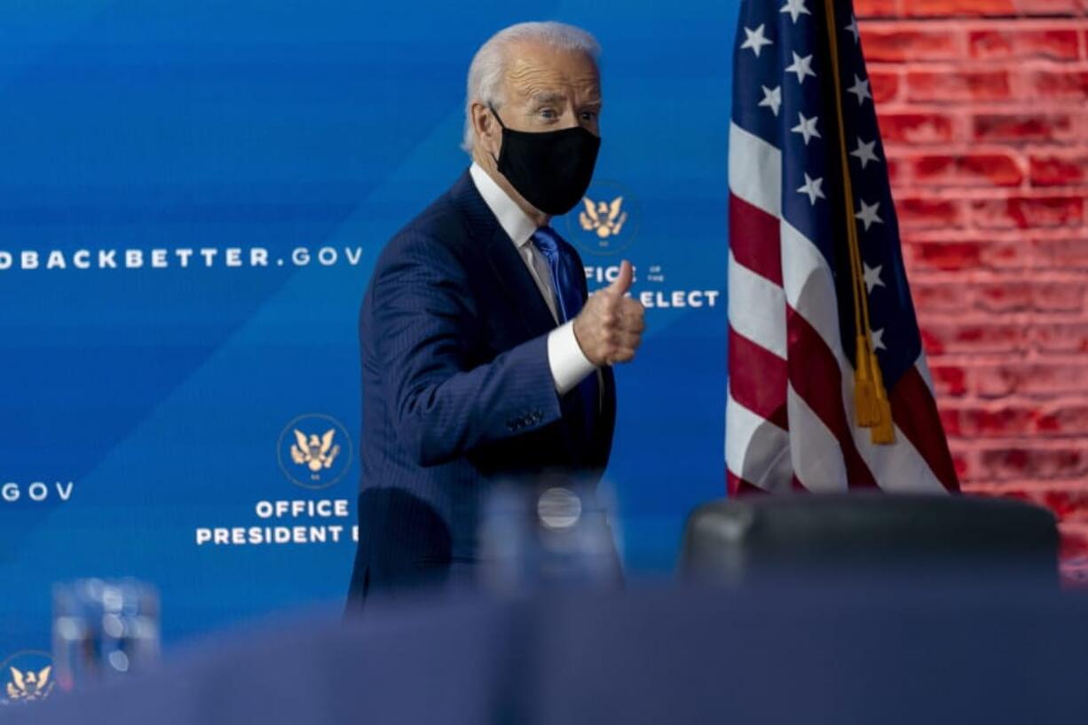 President-elect Joe Biden departs a news conference after introducing his nominees and appointees to economic policy posts at The Queen theater, Tuesday, Dec. 1, 2020, in Wilmington, Del.