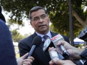 FILE - In this Thursday, Aug. 2, 2018, file photo, California Attorney General Xavier Becerra talks to reporters after a news conference at UCLA. President-elect Joe Biden has picked Becerra to be his health secretary, putting a defender of the Affordable Care Act in a leading role to oversee his administration&#039;s coronavirus response. (AP Photo/Jae C.