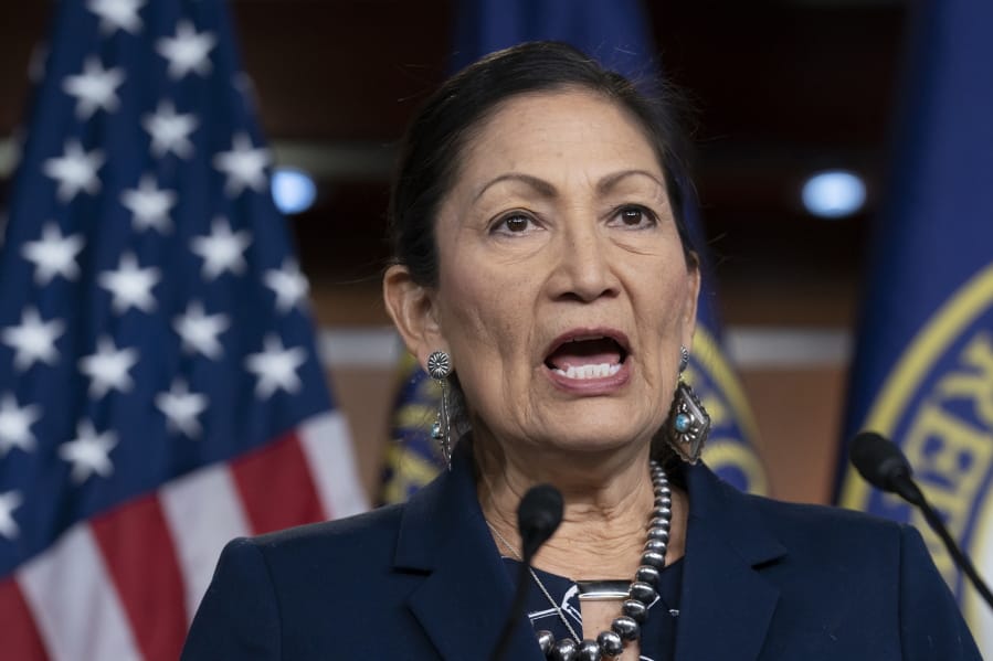 FILE - In this March 5, 2020, file photo Rep. Deb Haaland, D-N.M., Native American Caucus co-chair, speaks to reporters about the 2020 Census on Capitol Hill in Washington. President-elect Joe Biden plans to nominate Haaland as interior secretary. The historic pick would make her the first Native American to lead the powerful federal agency that has wielded influence over the nation&#039;s tribes for generations. (AP Photo/J.