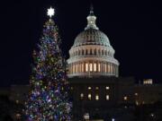 The 2020 U.S. Capitol Christmas Tree is lit after a ceremony on the West Front of Capitol Hill in Washington, with House Speaker Nancy Pelosi of Calif., Wednesday, Dec. 2, 2020. This year&#039;s tree is a 55-foot tall Engelmann spruce from Western Colorado and is decorated with handmade ornaments made by the people of Colorado. The Capitol Christmas Tree has been a tradition since 1964.